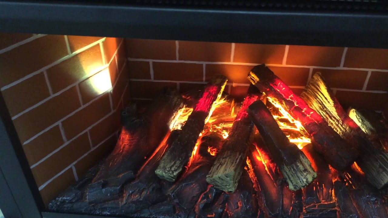 Встраиваемый электрический камин: тепло и пламя без открытого огня
